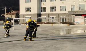 八道沟镇中小学校开展消防演练活动