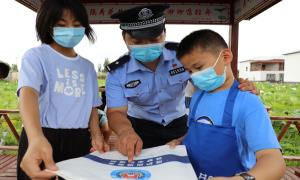 荷花池畔党旗红 警民共建新乡村