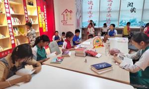 三〇团农家书屋：书香袅袅暑气消