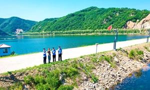 “智治”“共治”一体 绿水青山同在