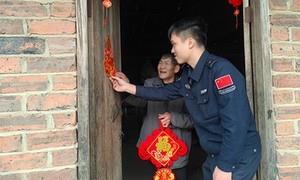 新春走访传温情 警民同心护平安