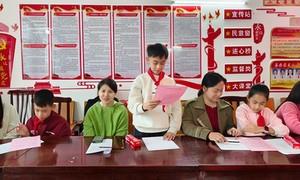 广西罗城：开展“诵经典传美德 学条例促阅读”暨《全民阅读促进条例》宣传进社区活动