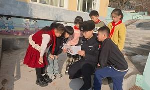 传承雷锋精神 护航边境学子