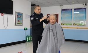 三月春风暖边关 义剪敬老传温情